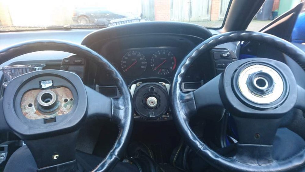 Steering wheels original on left.jpg