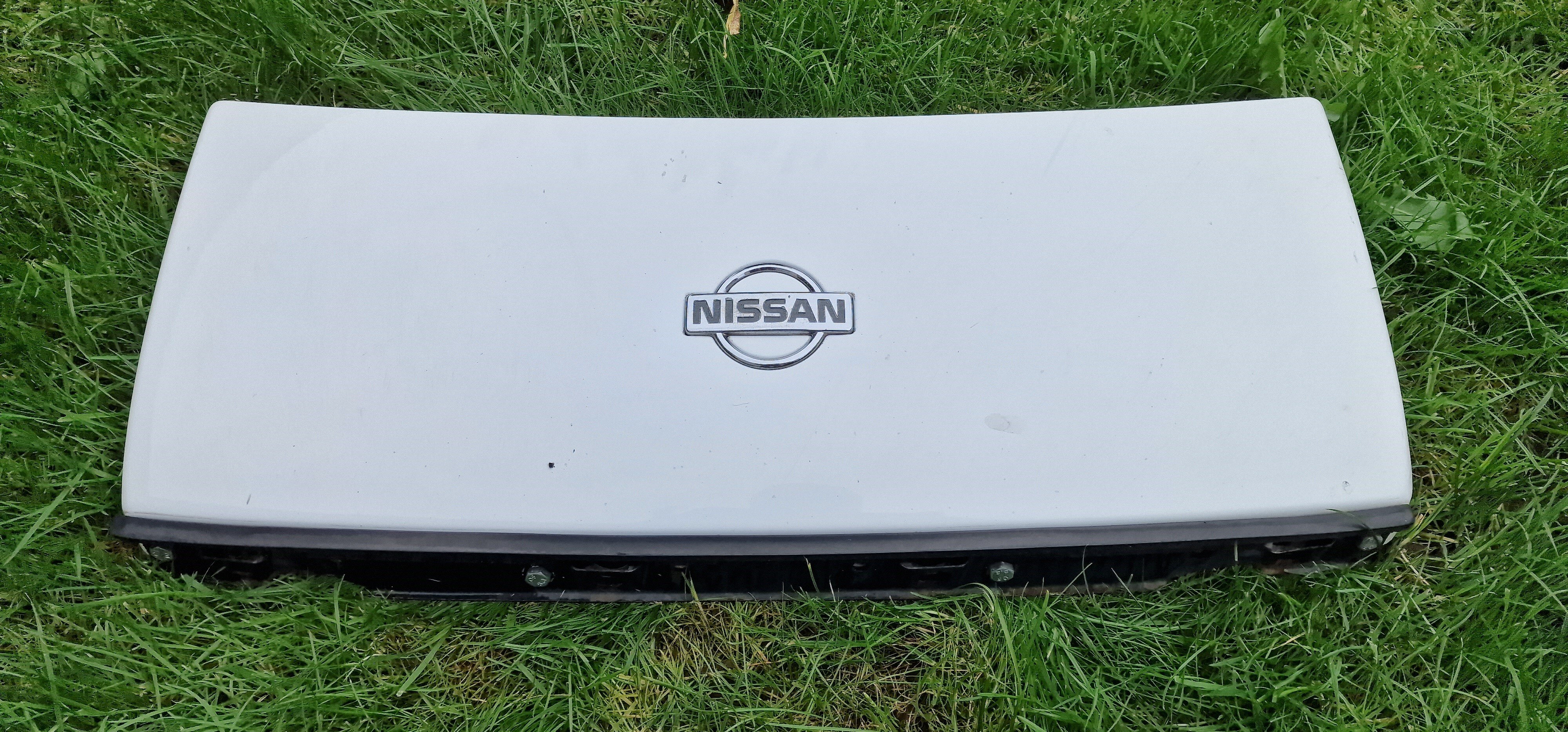 White Nose Panel with Badge